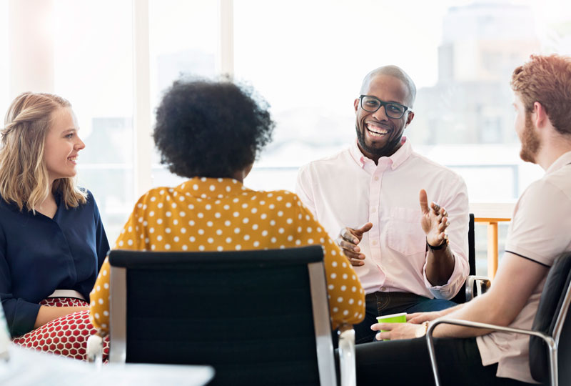 A group of people having a discussion 